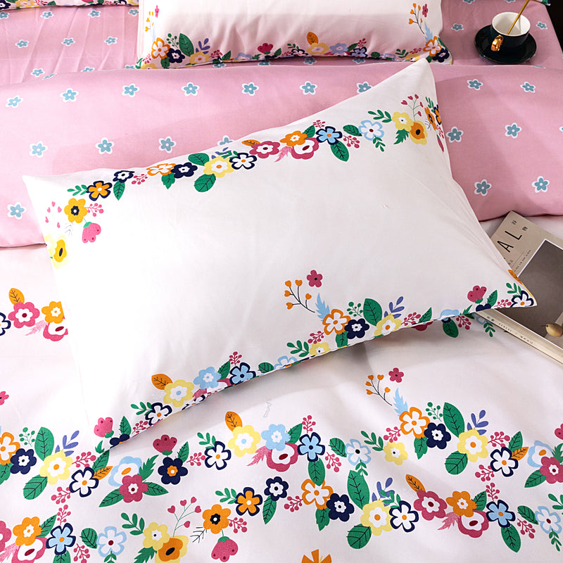 طقم مفرش سرير  بوجهين الابيض مع الزهور الملونه والوردي (كنج) مع الحشوة